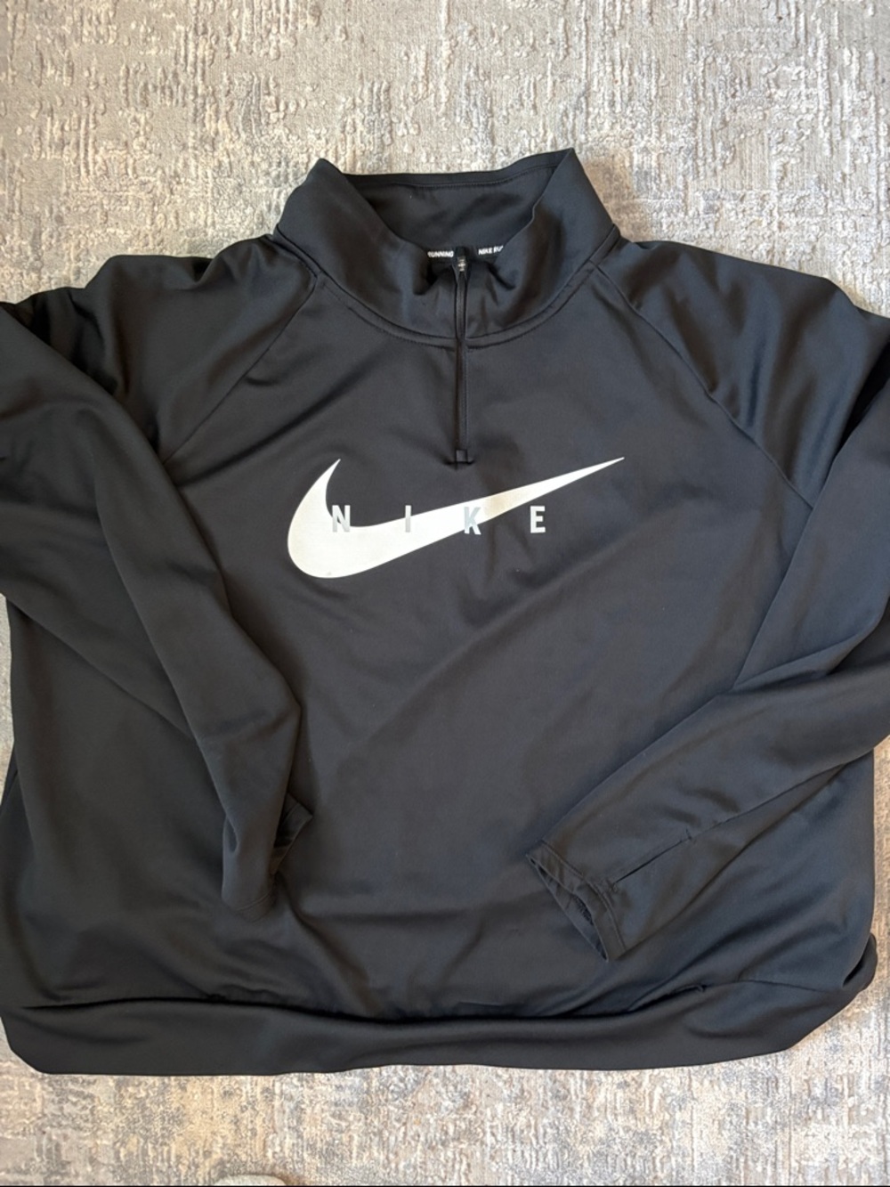 Nike Black Quarter-Zip Pullover with White Swoosh